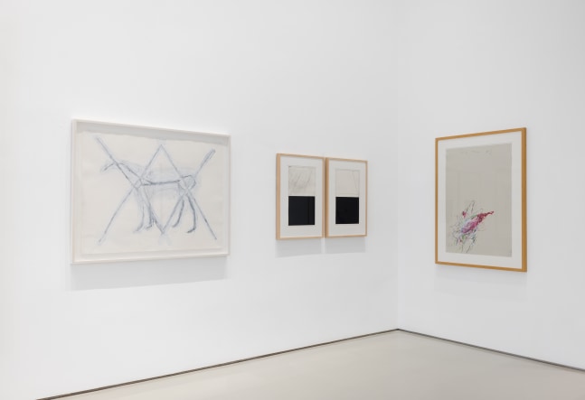 opposite corner of gallery pictured with four framed artworks