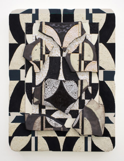 Mixed-media wall piece featuring fragmented ceramic tiles arranged on a geometric, black-and-cream patterned background. The tiles are irregularly broken, exposing textured edges, and display bold black arcs, lines, and crackled white surfaces that align with and disrupt the underlying grid-like composition.