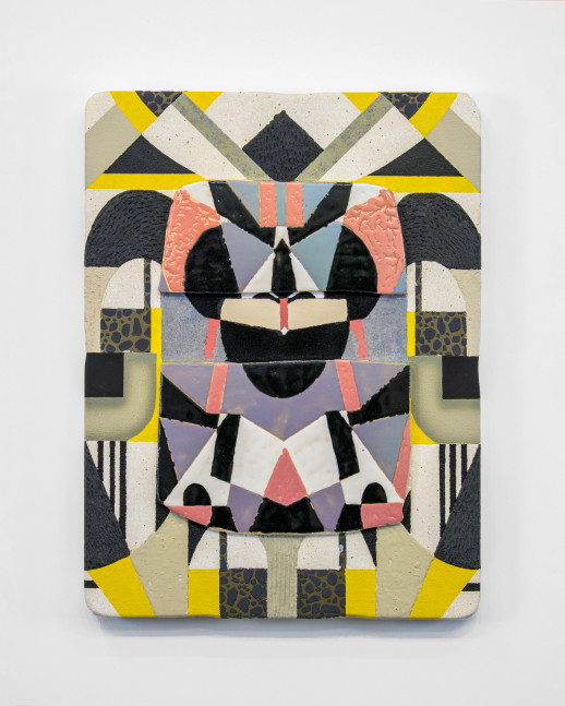 Geometric ceramic wall assemblage featuring layered, cut, and arranged tile fragments in bold black, cream, yellow, red, and muted lavender. The design creates a symmetrical, mask-like composition with curved and triangular shapes interlocking across the surface.
