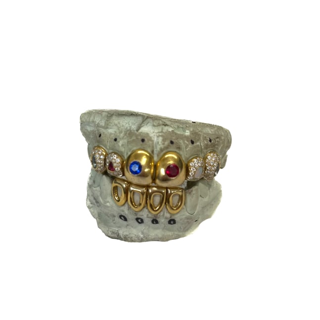 Blood and Water (Grillz), 2024

Ten-carat gold, red, blue, and white jewels, opal, and diamonds

2.5h in