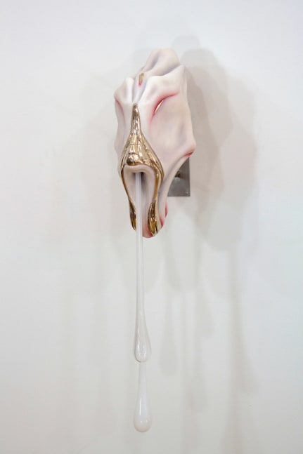 Frontal View of white angular sculpture by Ivana Bašić with bronze details and blown glass drips reminiscent of skin and flesh.
