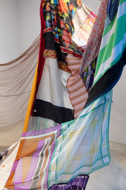 Eric N. Mack Landlord (detail), 2021 umbrella, wood flagpoles, metal brackets, fabric collage, thread dimensions variable