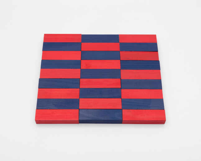 Carl Andre 27 Red/Blue Rectangle, New York, 2017 wood, 27 units  each: 5/8 x 3 1/16 x 7/8 in. (1.6 x 7.8 x 2.2 cm) overall: 5/8 x 7 3/4 x 9 1/8 in. (1.6 x 19.7 x 23.2 cm)