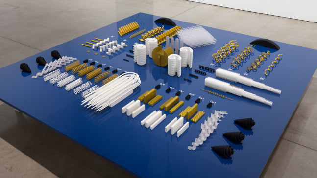 Tauba Auerbach Altar/Engine, 2015 3D printed nylon and plastic on table of aluminum, wood and paint an array of 126 elements ranging from 18 x 18 x 10 in. (45.7 x 45.7x 25.4 cm) to .0625 x 1 x 2 in. (.16 x 2.5 x 5.1 cm) Table: 15 x 108 x 108 in. (38.1 x 274.3 x 274.3 cm)