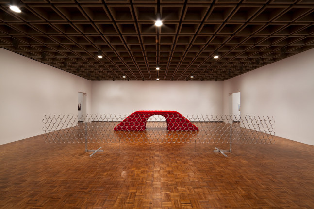 Robert Grosvenor Untitled, 2009 fiberglass, flocking and aluminum composed of two units: red unit: 48 x 48 x 192 in. (121.9 x 121.9 x 487.7 cm), aluminum unit: 48 x 312 x 1/2 in. (121.9 x 792.5 x 1.3 cm)