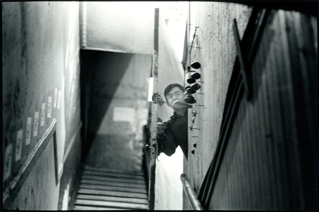 Peter Moore "George Maciunas & doorbell, Fluxhall/Fluxshop, 359 Canal Street, NY" June 1, 1964 Gelatin silver print 8 x 10 in.