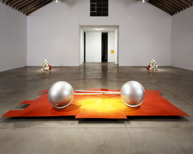 Robert Grosvenor Untitled, 1999 fossil rock, sheet metal, plastic and acrylic enamel paint rock pile left - 34 1/4 x 36 x 34 1/2” (85.6 x 90 x 86.2 cm), rock pile right - 34 1/4 x 35 1/2 x 36” (85.6 x 88.7 x 90 cm), platform - 5 3/4 x 176 x 89” (14.3 x 440 x 222.5 cm), two plastic elements - 24 1/2 x 24 1/2 x 93” (61.2 x 61.2 x 232.5 cm), each overall - 34 1/4 ” x 31’10” x 28’6” (85.6 cm x 9.5 m x 8.5 m)