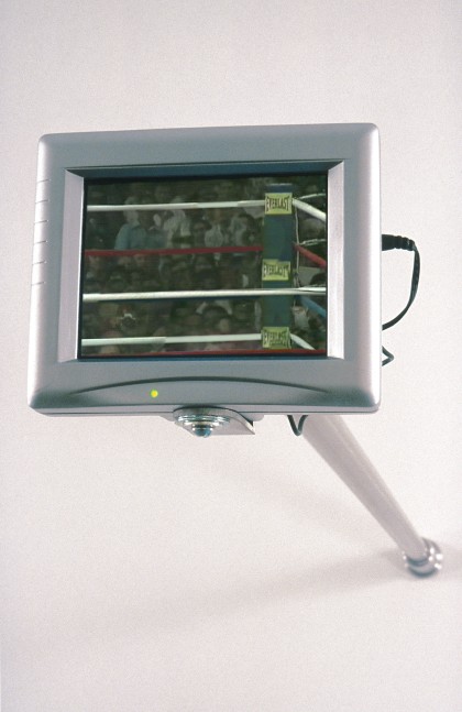 Paul Pfeiffer The Long Count (Thrilla in Manila), 2001 digital video loop with sound, LCD video monitor, metal armature, DVD player image size: 5 1/4  x 4 1/8 in. (13.3 x 10.5 cm) overall installation dimensions: 5 1/4  x 6 1/8 x 36 in. (13.3 x 15.6 x 91.4 cm) Edition 2 of 6, 1 AP running time: 2:58 looped