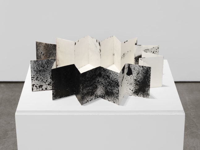 Bruce Conner UNFOLDING BOOK, 1993 black ink on paper mounted on paper, paper board front and back covers 4 7/8 x 3 5/8 x 1/4 in. (12.4 x 9.2 x .6 cm) unfolded 4 7/8 x 79 in.