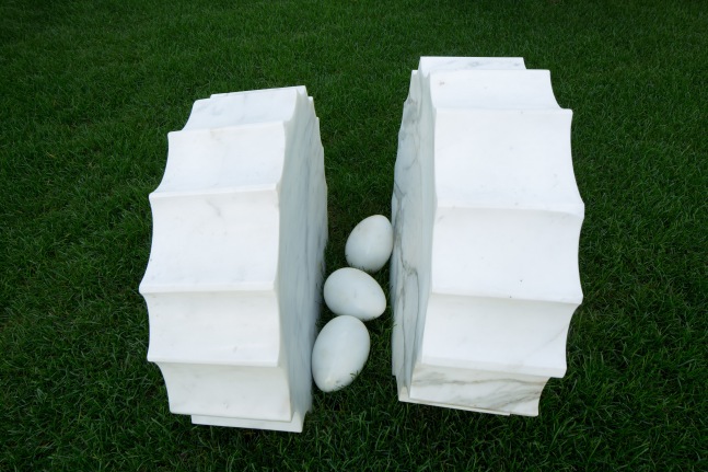 Luciano Fabro Il Nido, 1994 Carrara marble two column fragments, each: 33 1/2 in. (85 cm) diameter eggs, each: 9 4/5 in. (25 cm) diameter Photo: Agostino Osio Courtesy Galleria Christian Stein, Milan