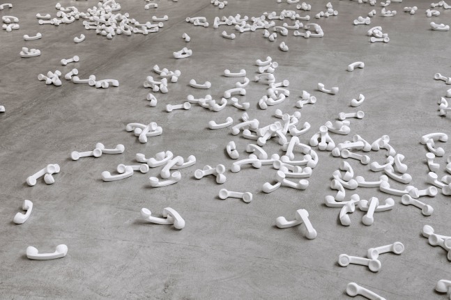 Christian Marclay, Boneyard, (detail), 1990; hydrostone casts of telephone receivers, in 750 parts; dimensions variable