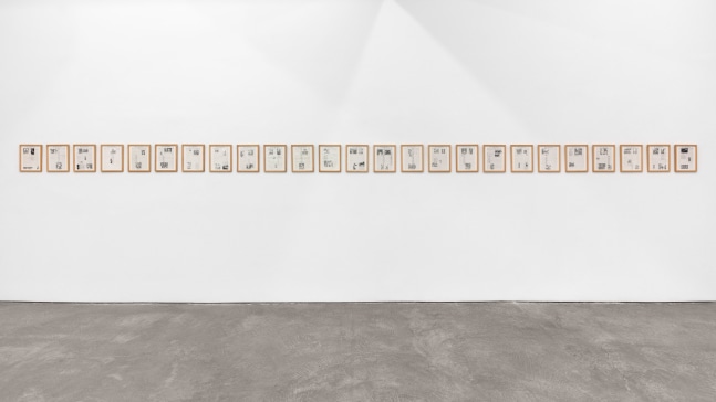 Installation view of Sarah Charlesworth's piece Historical Materialism: Chile Series (for O.L.), from 1976-1977. 25 photostat prints.