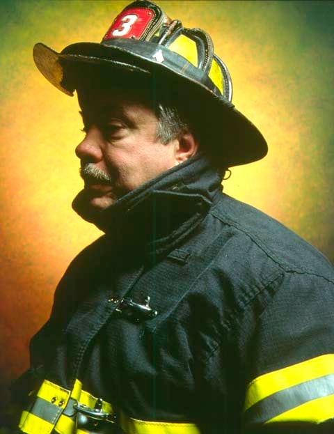 Andres Serrano "America (Firefighter John L. Thomasian)" 2002 Cibachrome, silicone, plexiglas, wood frame 60 x 49 1/2 in.