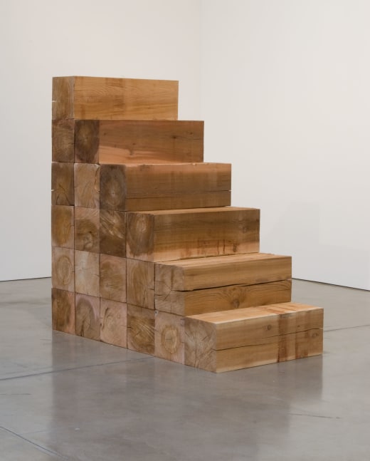 Carl Andre Merrymount, 1980 21 Western Red cedar timbers each: 12 x 36 x 12 in. (30.5 x 91.4 x 30.5 cm) overall: 72 x 36 x 72 in. (182.9 x 91.4 x 182.9 cm) 21-unit stepped pyramid of horizontal timbers
