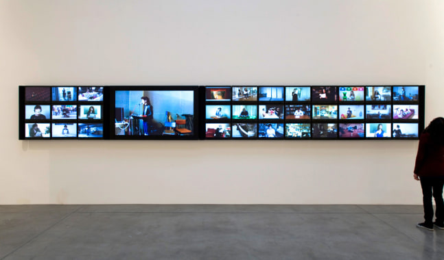 Sophie Calle Prenez soin de vous. Video Wall and Portraits, 2007 portraits (33): Fine Art prints dry mounted on aluminum, wooden frames, glass films (33): flat screen monitors, speakers, metal armature 38 1/4 x 289 1/2 in. (97.2 x 735.3 cm) 1 Unique Set, 1 Complete Set French, 1 Complete Set English