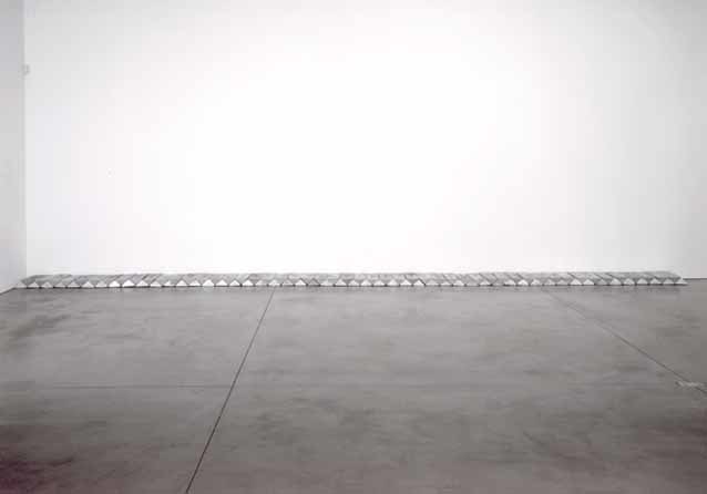 Carl Andre "Altozano" 2002 101 aluminum ingots 4" x 31' 4" x 1' 6" overall