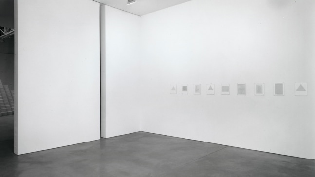 Installation view, Typewriter Drawings 1963 and Blue Cut Trials 1963, Paula Cooper Gallery, 534 W 21st Street, New York. November 29 - December 20, 1997. © 2025 Carl Andre / Artists Rights Society (ARS), New York. Courtesy Paula Cooper Gallery, New York.