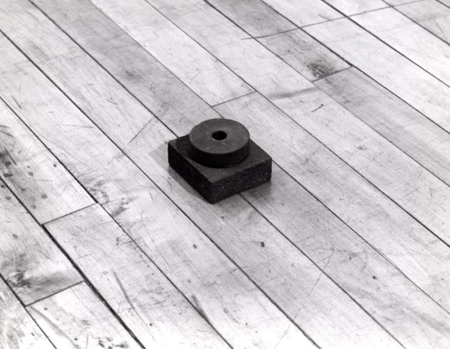 Carl Andre "Navel" 1988 Steel block and steel ring 1 3/4" x 2 3/4" x 3"