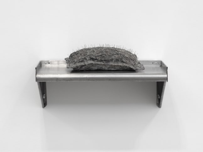 Veronica Ryan Pin Cushion, 1986 lead foil, cushion, pins, ink cushion: 5 1/2 x 14 1/2 x 8 1/8 in. (14 x 36.8 x 20.6 cm) shelf: 9 3/4 x 24 1/4 x 11 1/2 in. (24.8 x 61.6 x 29.2 cm)