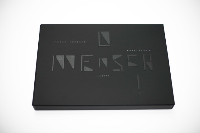O Mensch!
Pascal Dusapin, 2011

Musical creation on Friedrich Nietzsche&amp;rsquo;s poetry, performed on November 15th, 2011 at the
Th&amp;eacute;&amp;acirc;tre des Bouffes du Nord in Paris
Art box conceived by Philippe Apeloig
10&amp;quot; x 13.7&amp;quot; x 1&amp;quot;

Edition of 133 which includes the facsimile of Pascal Dusapin&amp;rsquo;s original music score, as well as a portfolio of nine documents:
- 111 numbered and signed copies. The 30 first come with an original photograph of Pascal Dusapin, signed for the patrons
- 11 numbered artist proofs, signed and annotated &amp;lsquo;ea&amp;rsquo; (&amp;lsquo;&amp;eacute;preuves d&amp;rsquo;artistes&amp;rsquo;)
- 11 proofs &amp;lsquo;hors commerce&amp;rsquo; numbered, signed and annotated &amp;lsquo;hc&amp;rsquo;
$1400 (Pre-tax)

Printed and published by Idem Paris

INQUIRE
