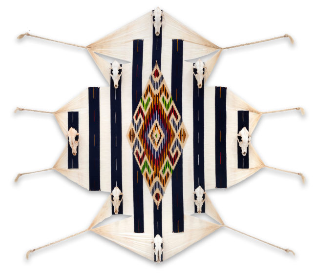 Kelly Tapia-Chuning

voicing the silenced; we survive you, 2024

dismantled serape, reclaimed coyote skulls from a coyote &amp;ldquo;dump&amp;rdquo; site in southern Utah, copper nails, interfacing

70 x 77 x 3 in.
177.8 x 195.6 x 7.6 cm.

(TAPI001)