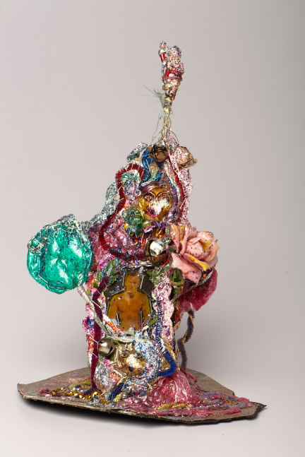 Thomas Lanigan-Schmidt
Knick Knack (Green Lollipop Pink Rose), 1970
Foil, plastic wrap, pipe cleaner, linoleum, glitter, acrylic floor shine
and food coloring, staples, Magic marker, printed material, and
found objects
13.5 x 8 x 9 inches&amp;nbsp;
Courtesy of the artist and Pavel Zoubok Fine Art, New York