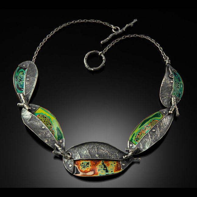 Patched Leaf Necklace with Twigs
Sterling Silver, copper, enamel, and epoxy
18&amp;quot; x 2&amp;quot; x .25&amp;quot;
2019