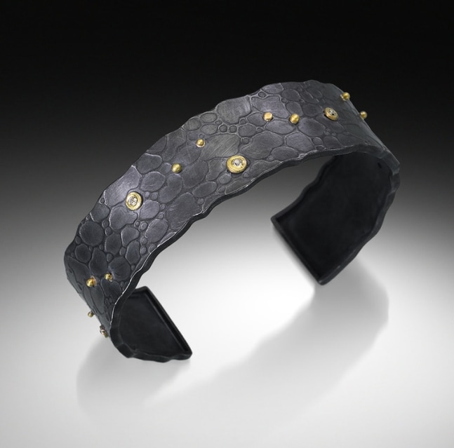 Wide Cuff with Diamonds
Textured and fabricated oxidized sterling silver cuff with 18k gold and diamonds.
2.5&amp;quot; x 2&amp;quot; x .62&amp;quot;
2019