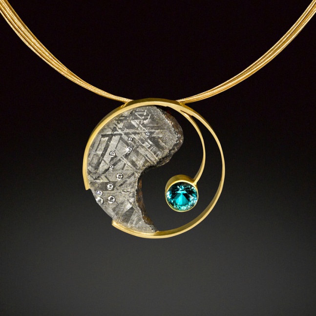 Aquamarine Yin Yang Pendant
Pendant in Gibeon Meteorite with 18k gold and diamonds, featuring a 1.96 ct aquamarine. Fabricated and etched.
1.5&amp;quot; x 1.5&amp;quot; x .25&amp;quot;
2016