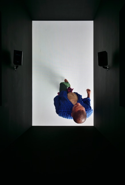 Installation view of video work by Adam Pendleton