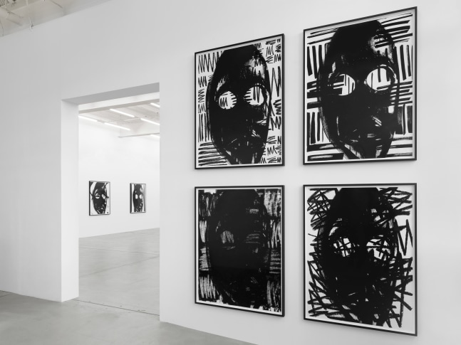 Installation view of Adam Pendleton and Pope.L wall-based works and sculptural installation