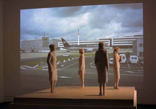 Installation view of video work and sculptures by Peter Fischli and David Weiss