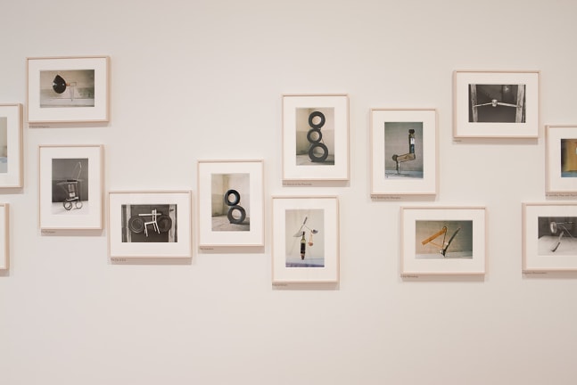 Installation views of photographs by Peter Fischli and David Weiss