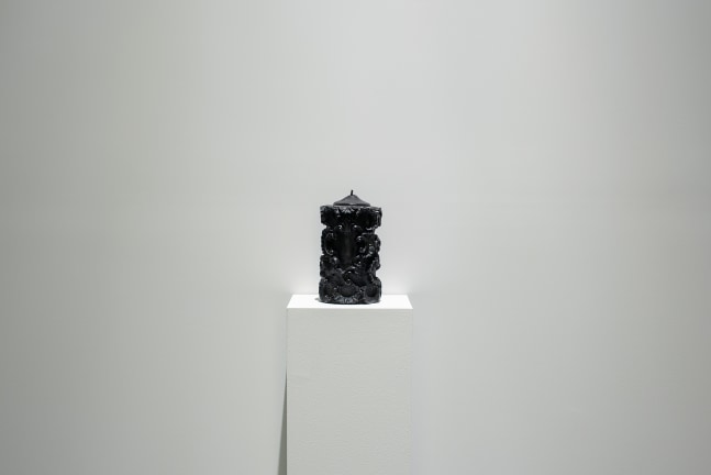 Installation view of sculptures by Peter Fischli and David Weiss and works by Wade Guyton