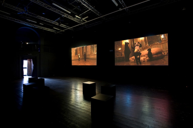 Installation view of video works by Peter Fischli and David Weiss