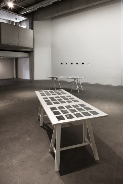 Installation view of photographs by Peter Fischli and David Weiss