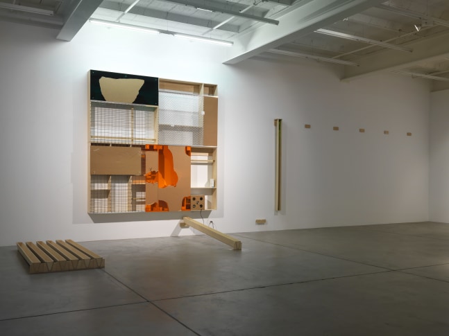 Installation view of Adam Pendleton and Pope.L wall-based works and sculptural installation