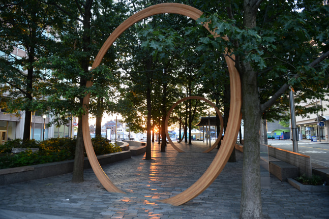 Outdoor view of sculptures by Oscar Tuazon