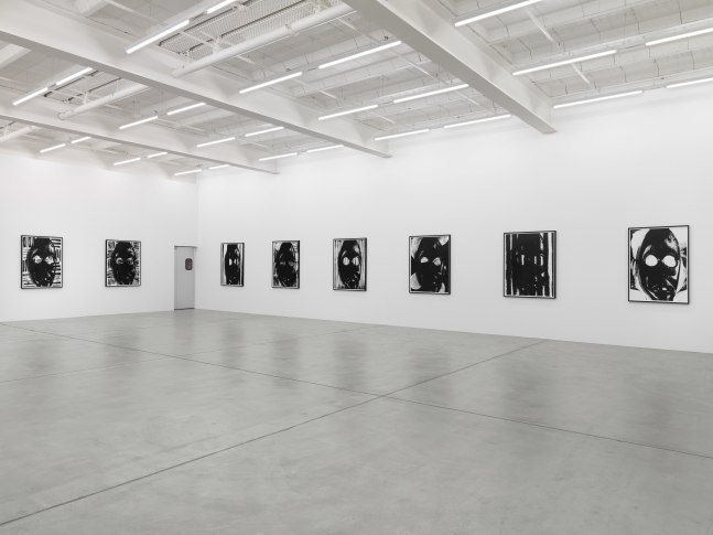 Installation view of Adam Pendleton and Pope.L wall-based works and sculptural installation