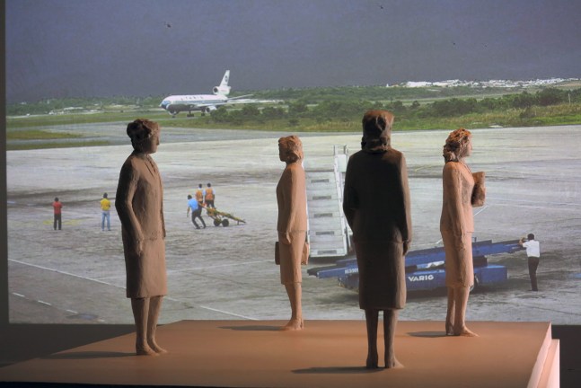 Installation view of video work and sculptures by Peter Fischli and David Weiss