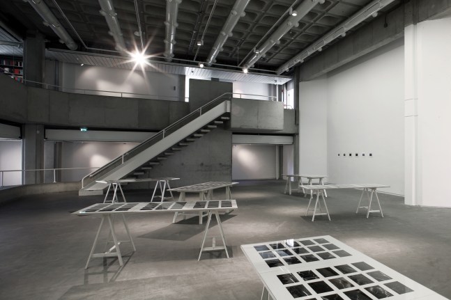 Installation view of photographs by Peter Fischli and David Weiss