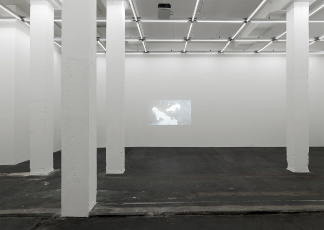 Installation view of Peter Fischli David Weiss film and sculpture exhibition