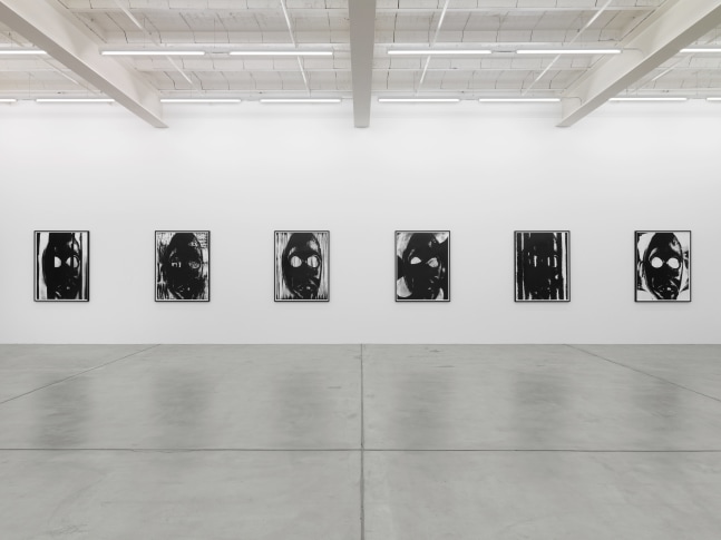 Installation view of Adam Pendleton and Pope.L wall-based works and sculptural installation