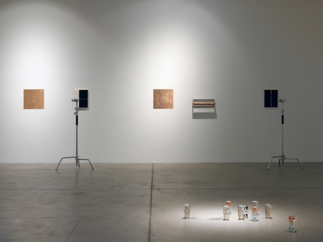 Installation view of Adam Pendleton and Pope.L wall-based works and sculptural installation