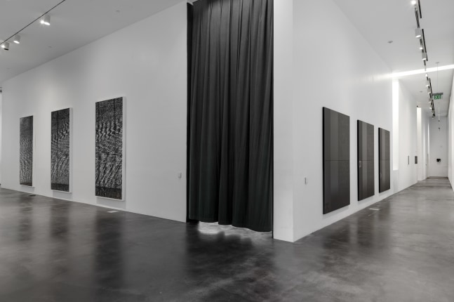 Installation view of paintings by Adam Pendleton