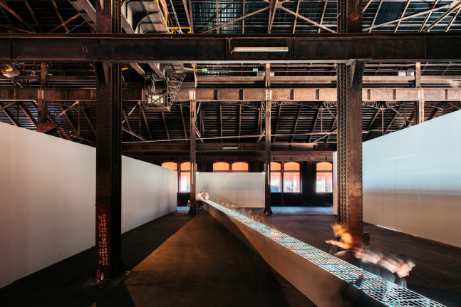 Installation view of images by Peter Fischli David Weiss