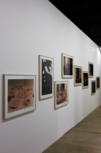 Installation view of sculptures and photographs by Peter Fischli and David Weiss