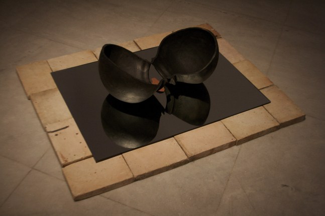 Fragment from Splitting, 1993
Bricks, Mirror, Gheru and Terracotta
41” x 32”
 