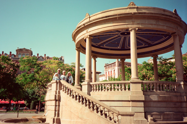 Al-An deSouza and Yong Soon Min
Tress/Pass: Plaza del Castillo, 1998/2024
Performance documentation, digital inkjet print
12" x 16"
