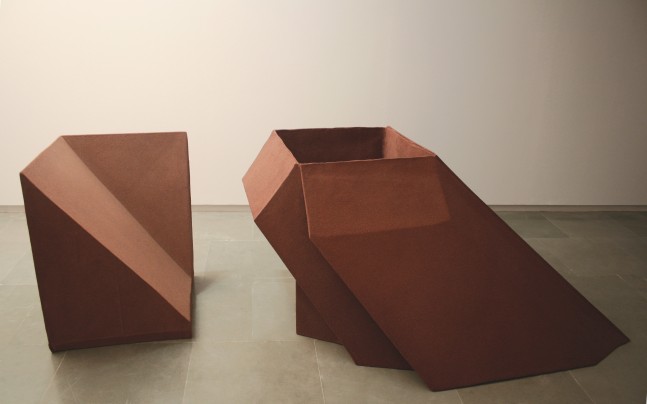Container as content, 2006
Fiberglass cast of the shadow space of corrugated box, sand
70” x 34” x 57";  25” x 34” x 25”